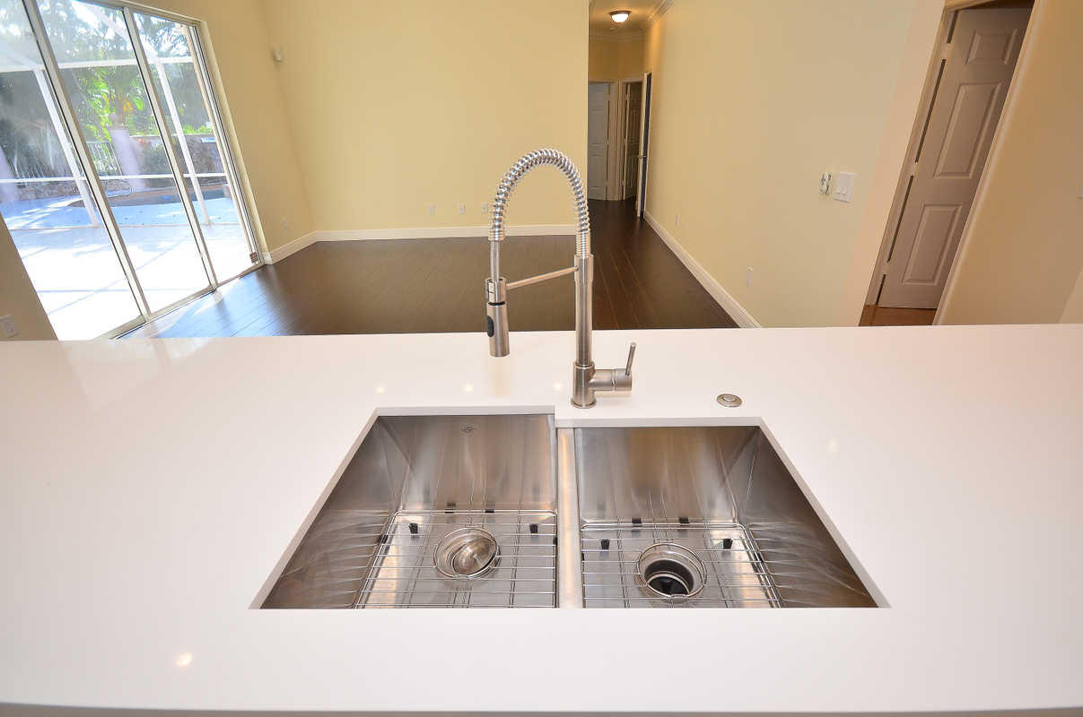 6601 Northwest 23rd Way Boca Raton, FL 33496 - Photo 6 of 36 KITCHEN/FAMILY