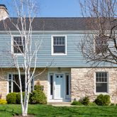 front view of a house and a yard