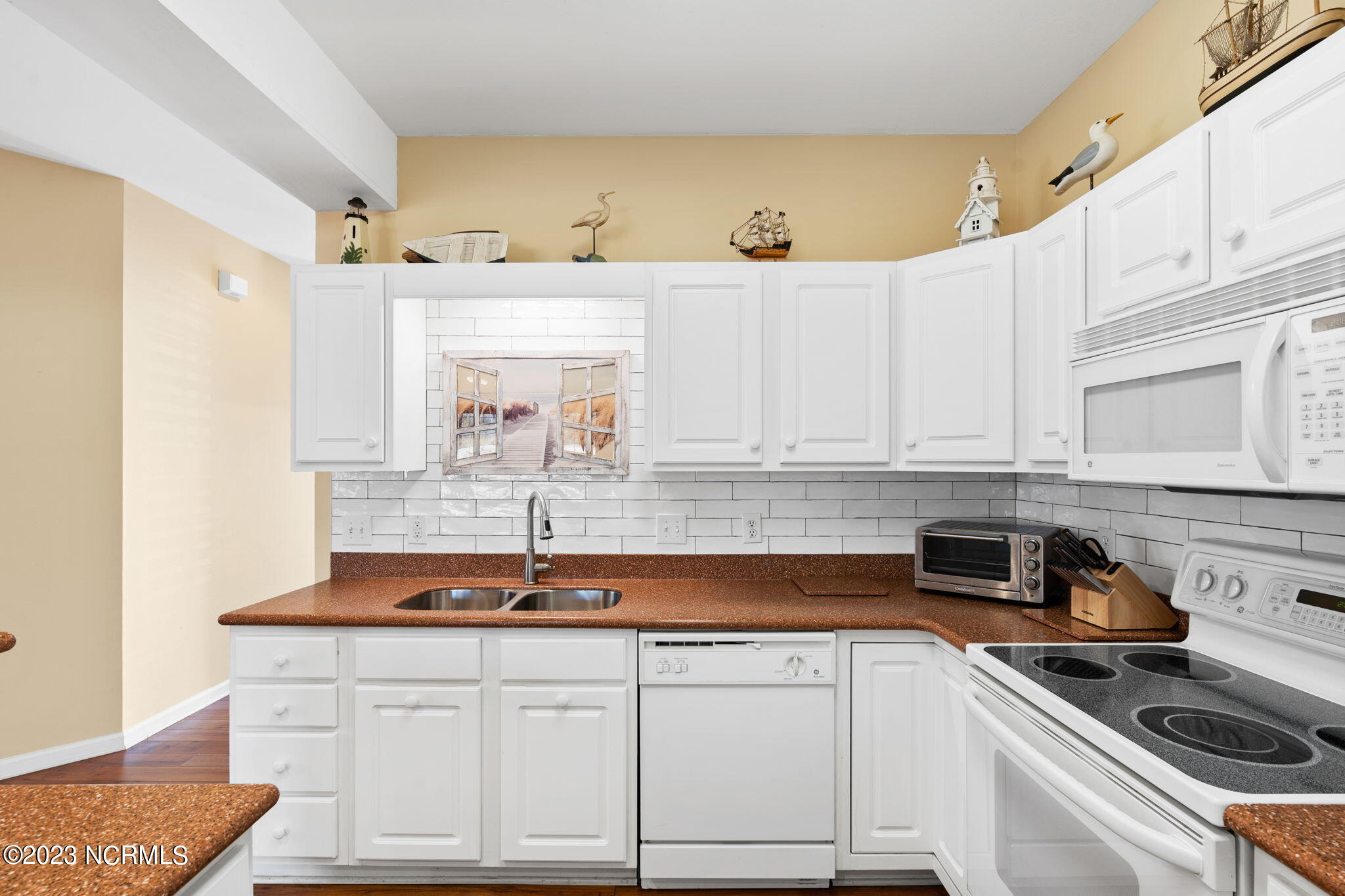 126 Rice Mill Circle, Unit 2 Sunset Beach, NC 28468 - Photo 11 of 90 Kitchen w new backsplash