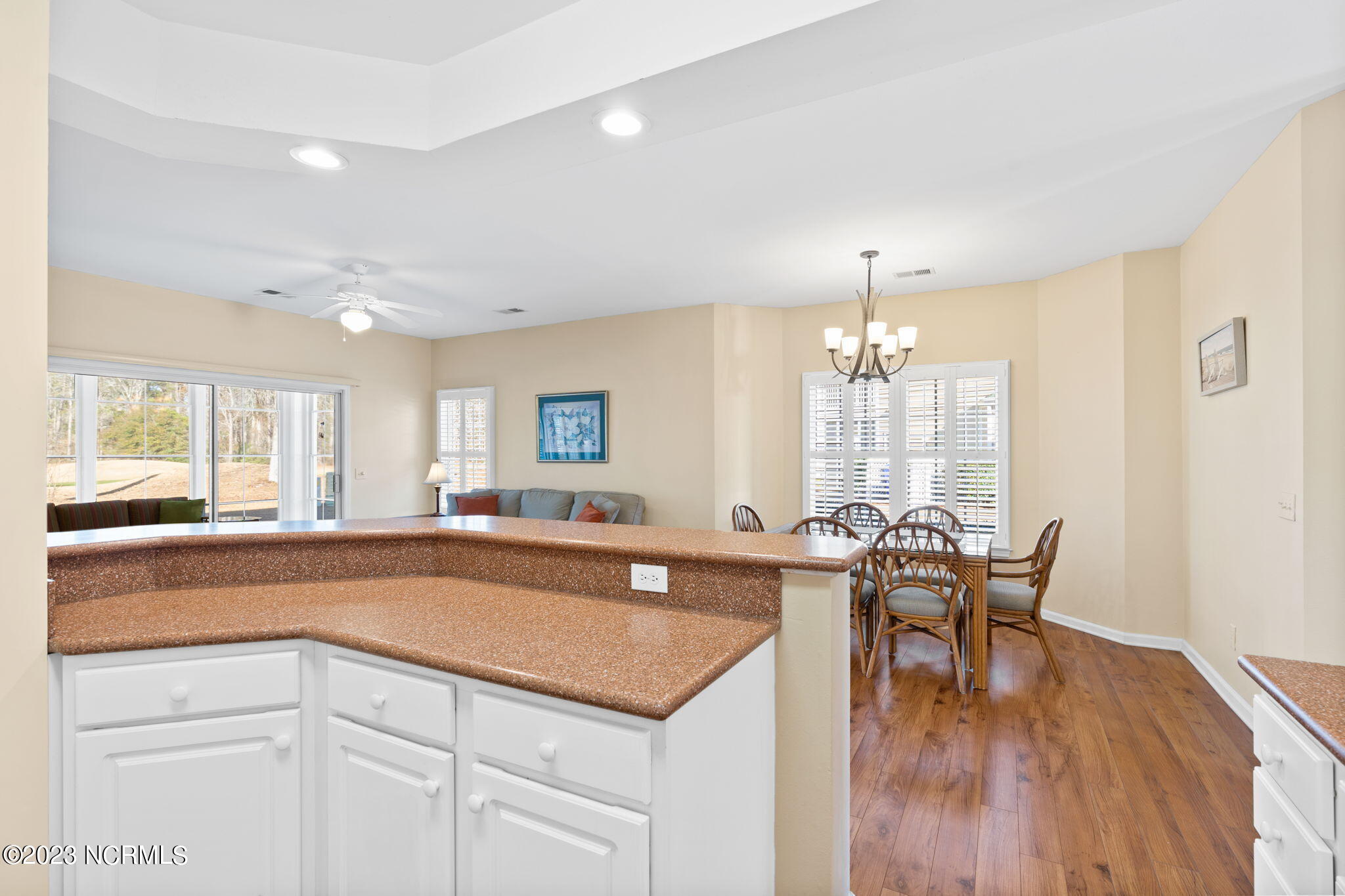 126 Rice Mill Circle, Unit 2 Sunset Beach, NC 28468 - Photo 13 of 90 View from kitchen to dining room