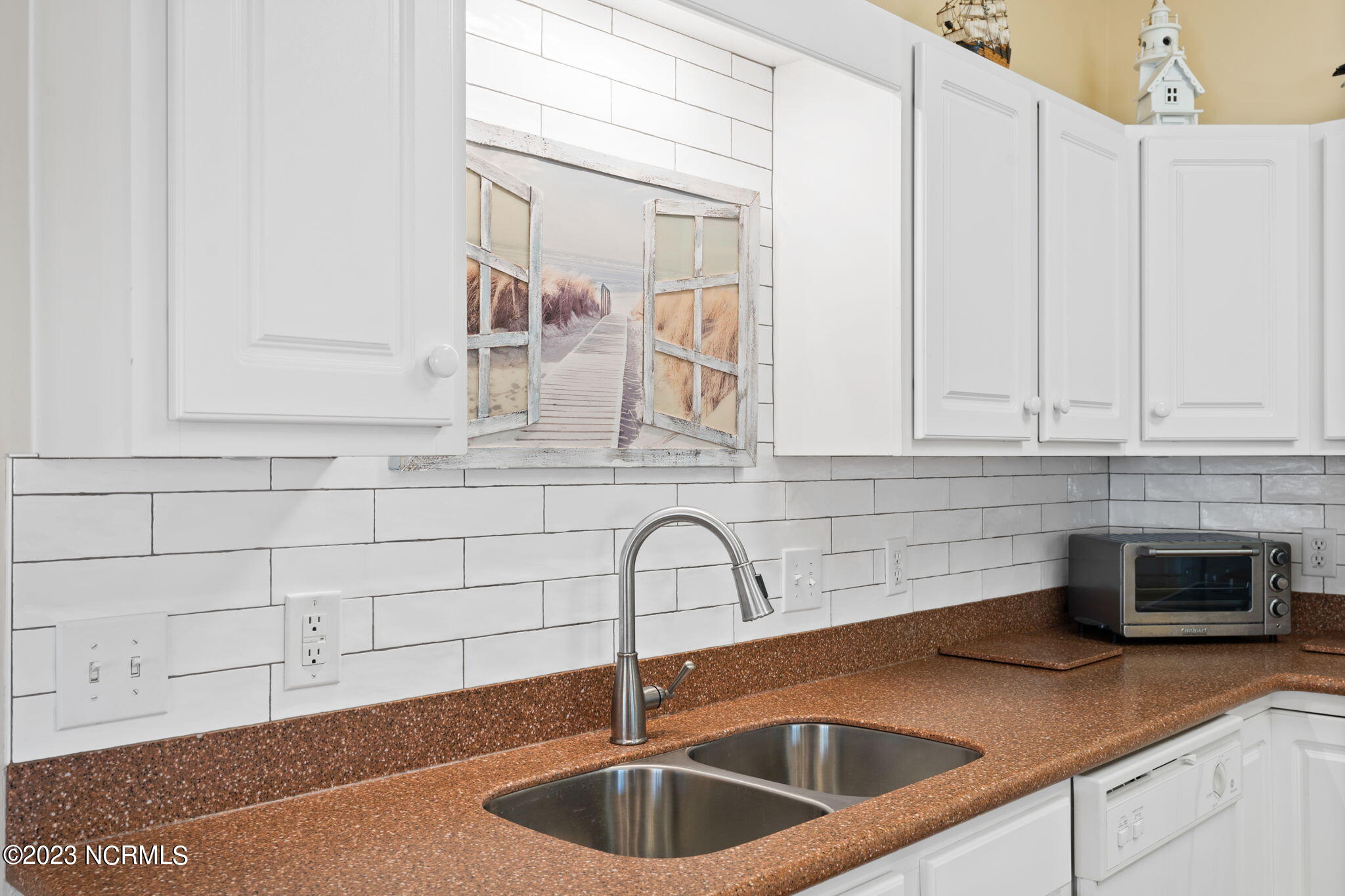 126 Rice Mill Circle, Unit 2 Sunset Beach, NC 28468 - Photo 14 of 90 Backsplash with new faucet