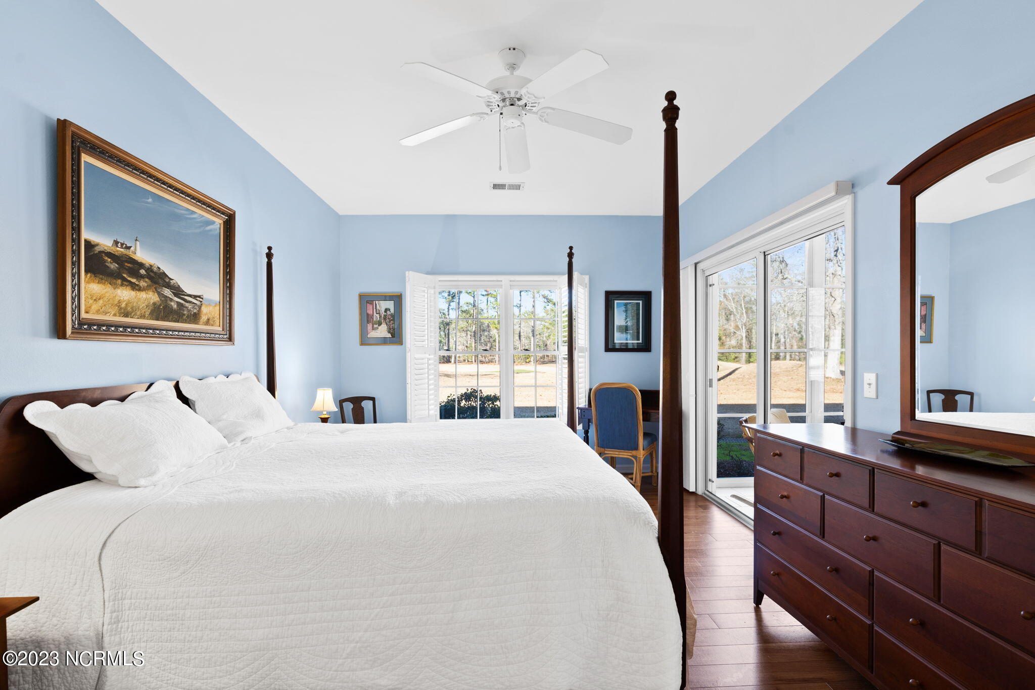 126 Rice Mill Circle, Unit 2 Sunset Beach, NC 28468 - Photo 18 of 90 Primary bedroom w access to sunroom