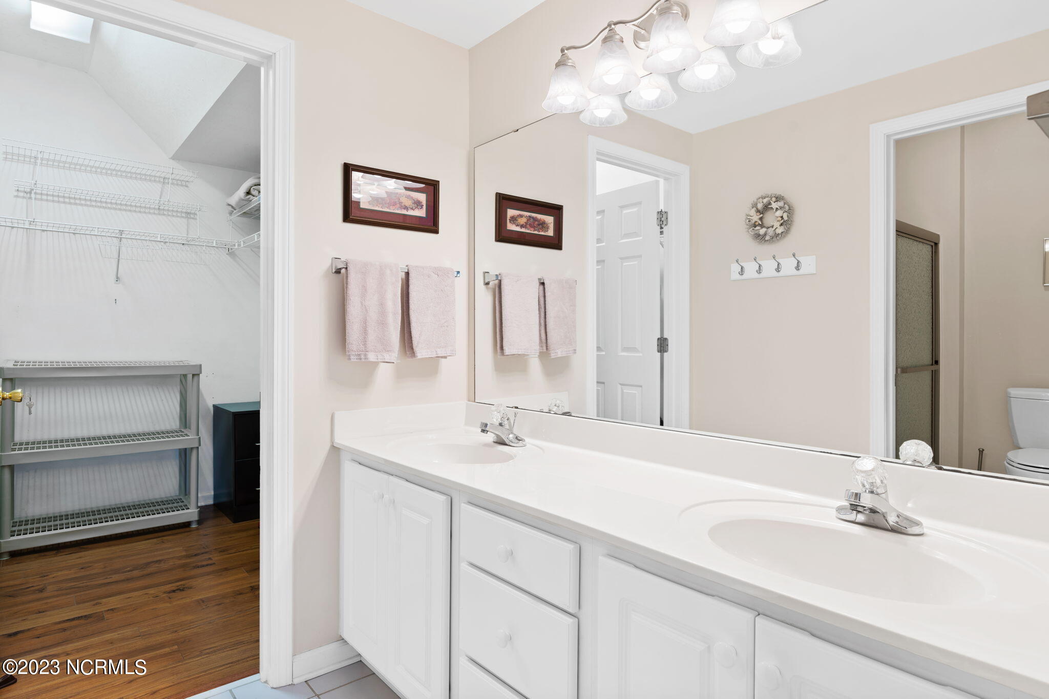 126 Rice Mill Circle, Unit 2 Sunset Beach, NC 28468 - Photo 22 of 90 Primary bath with dual vanities