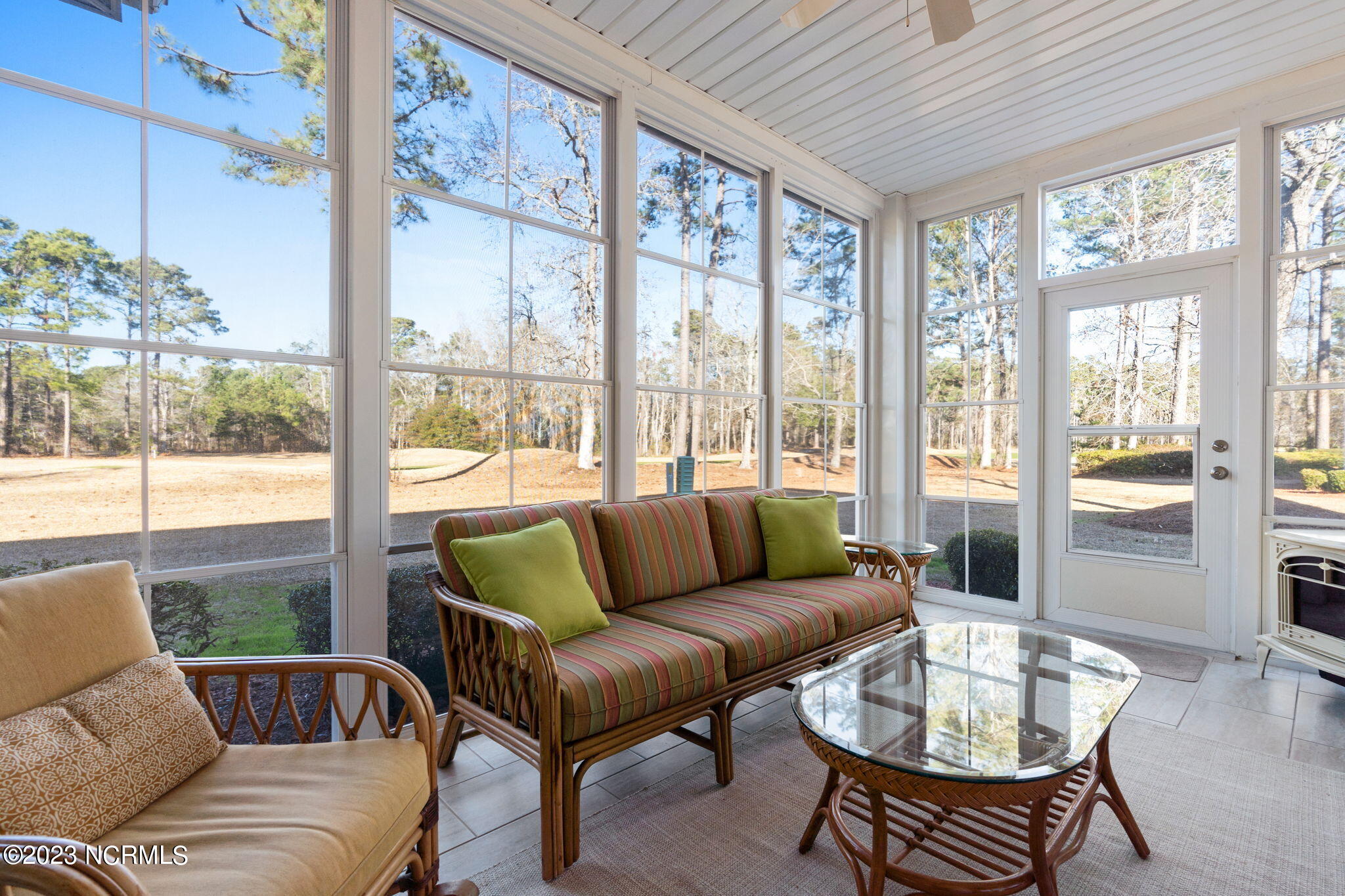126 Rice Mill Circle, Unit 2 Sunset Beach, NC 28468 - Photo 28 of 90 3 season room with golf course view