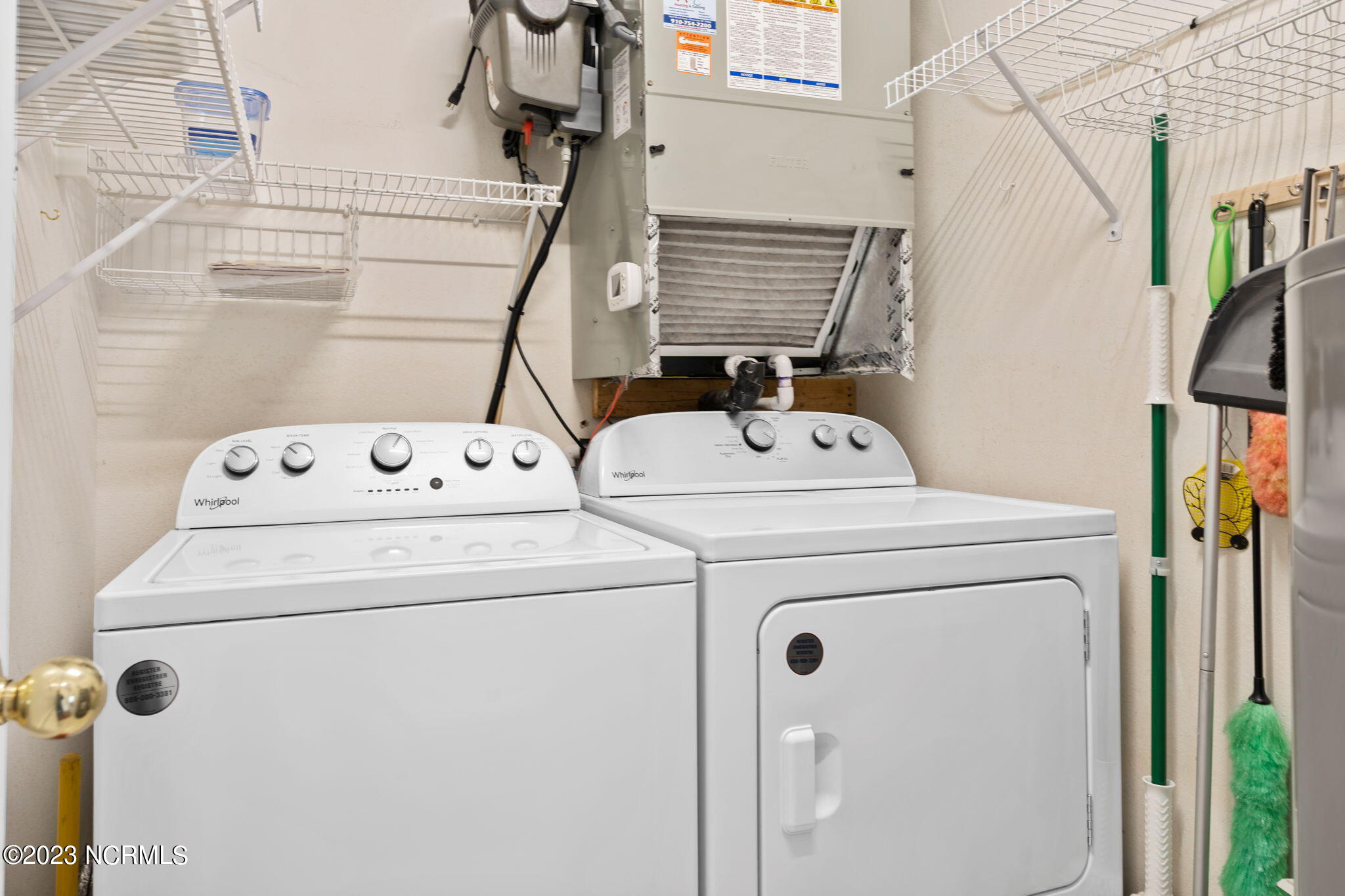 126 Rice Mill Circle, Unit 2 Sunset Beach, NC 28468 - Photo 33 of 90 Laundry room with washer/dryer