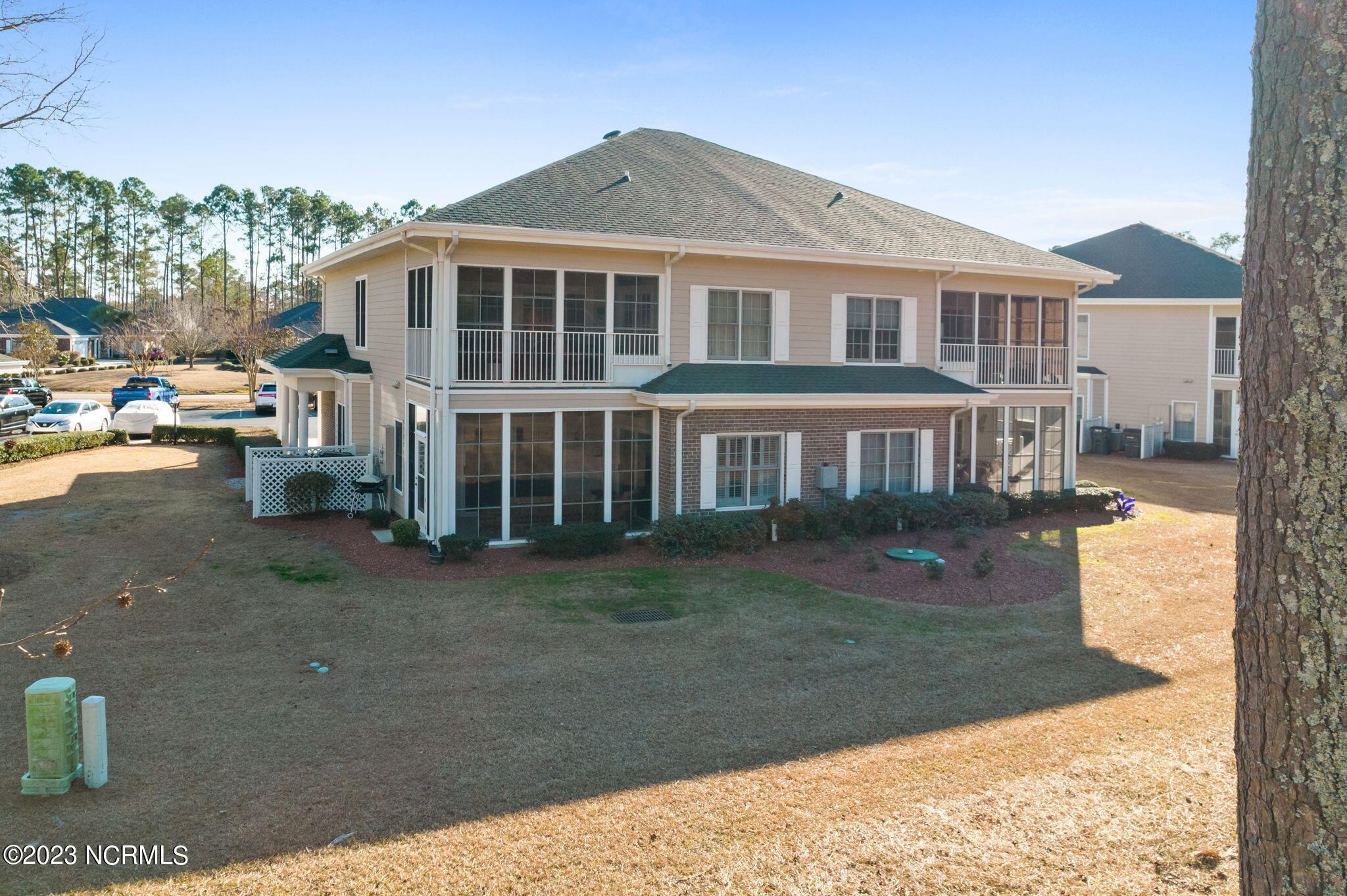 126 Rice Mill Circle, Unit 2 Sunset Beach, NC 28468 - Photo 42 of 90 Rear elevation