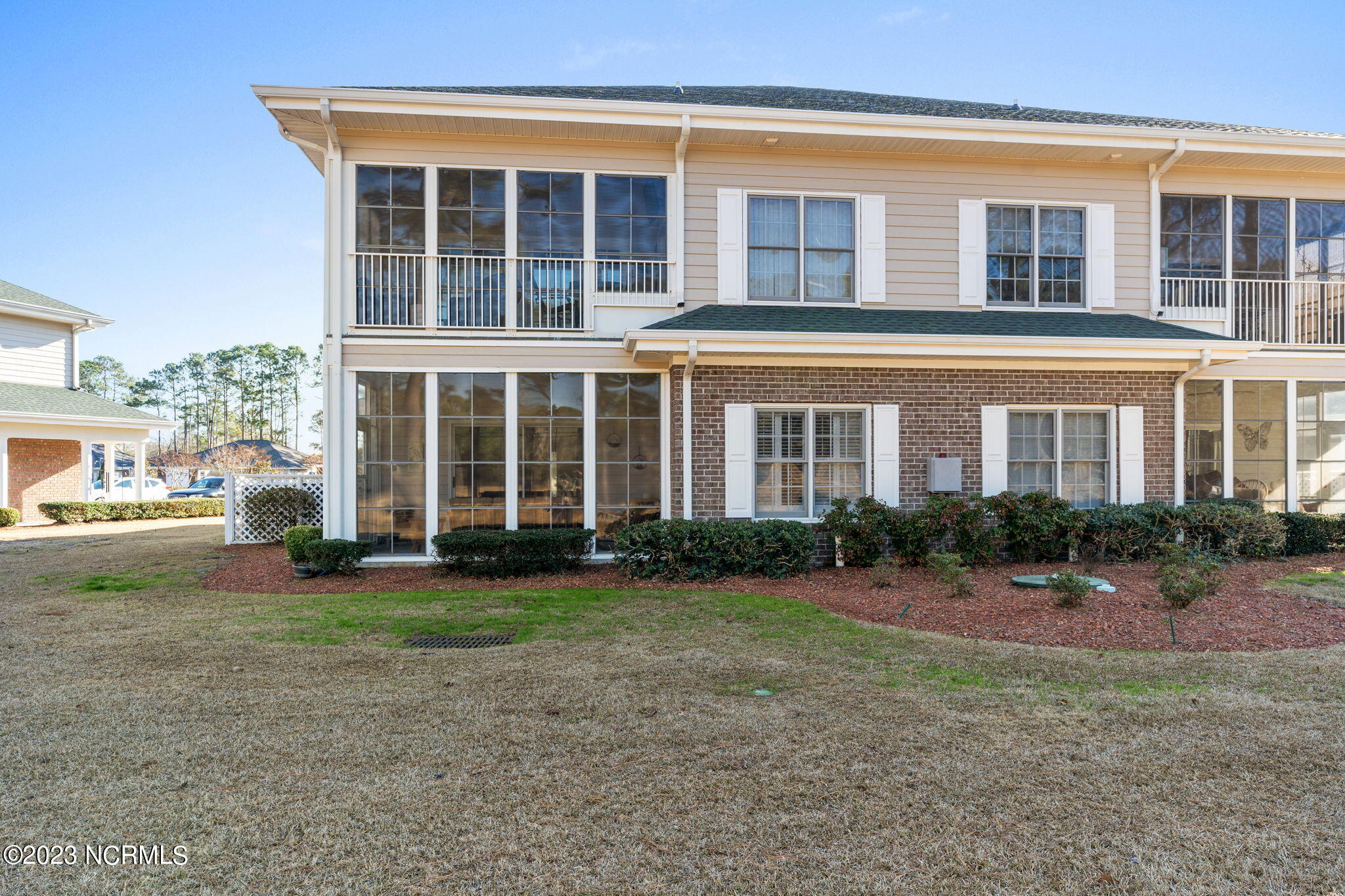 126 Rice Mill Circle, Unit 2 Sunset Beach, NC 28468 - Photo 43 of 90 Rear elevation