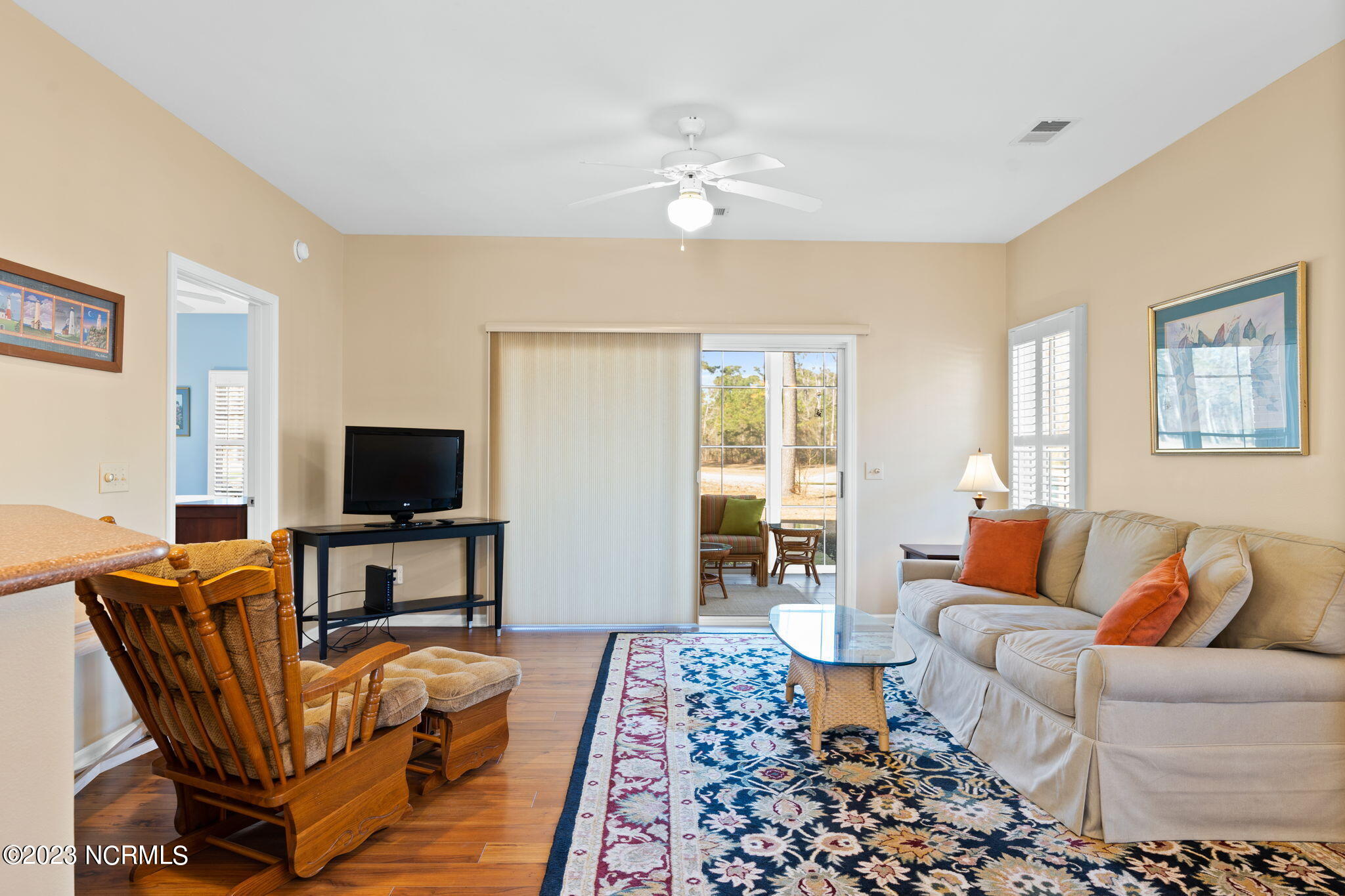 126 Rice Mill Circle, Unit 2 Sunset Beach, NC 28468 - Photo 6 of 90 Living Room w Blind