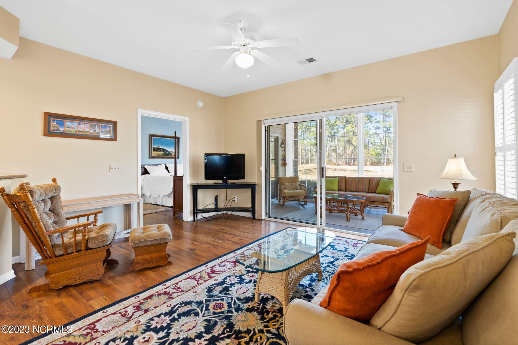 126 Rice Mill Circle, Unit 2 Sunset Beach, NC 28468 - Photo 7 of 90 Living Room to porch