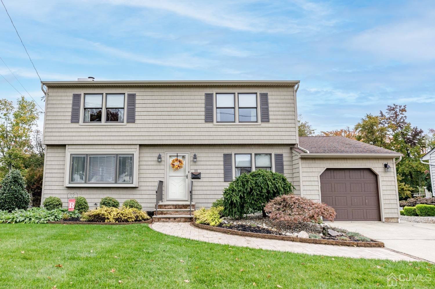 55 Old Post Road Edison, NJ 08817 - Photo 1 of 53 a front view of house with yard and green space