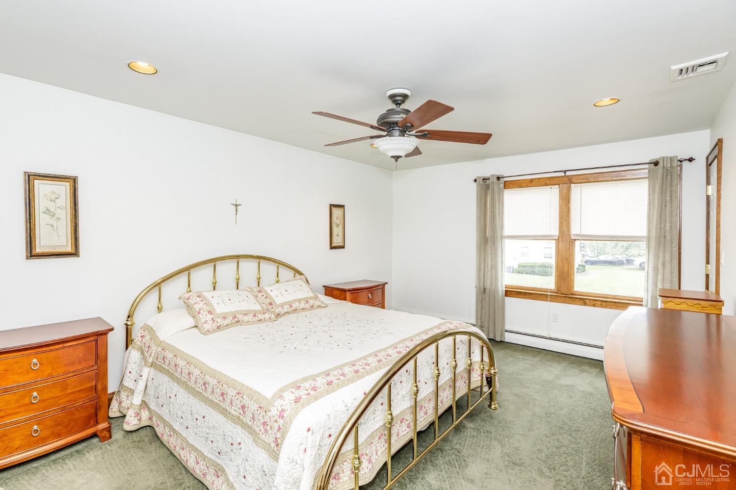 55 Old Post Road Edison, NJ 08817 - Photo 19 of 53 a living room with a bed furniture and a window