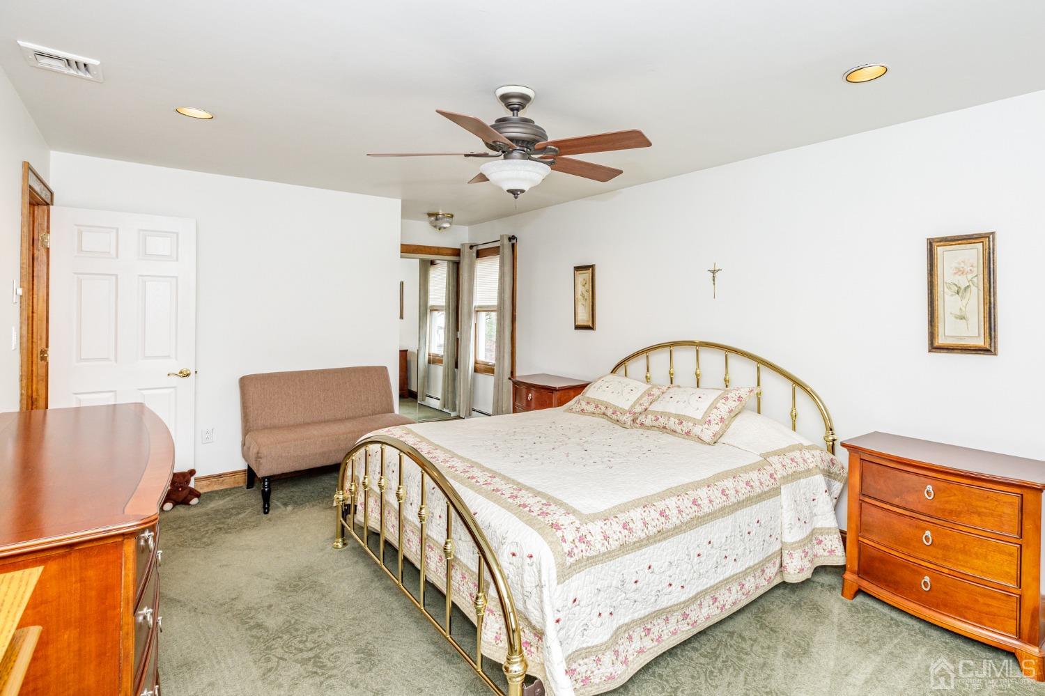 55 Old Post Road Edison, NJ 08817 - Photo 20 of 53 a bedroom with a bed and a dresser
