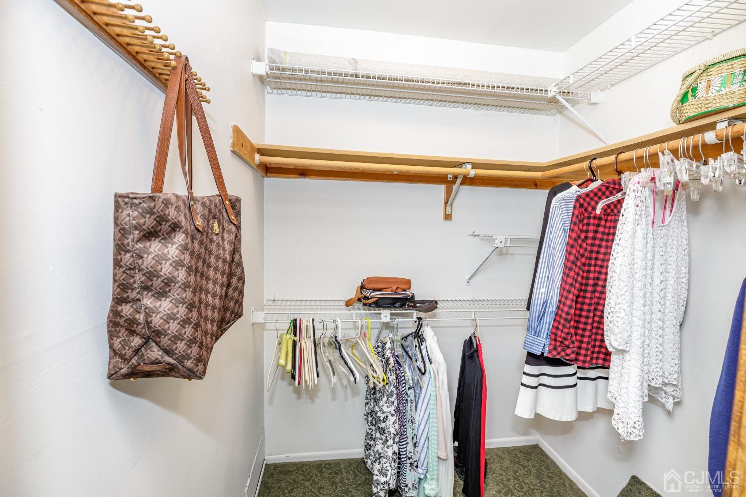 55 Old Post Road Edison, NJ 08817 - Photo 22 of 53 a view of walk in closet with clothes and shoes