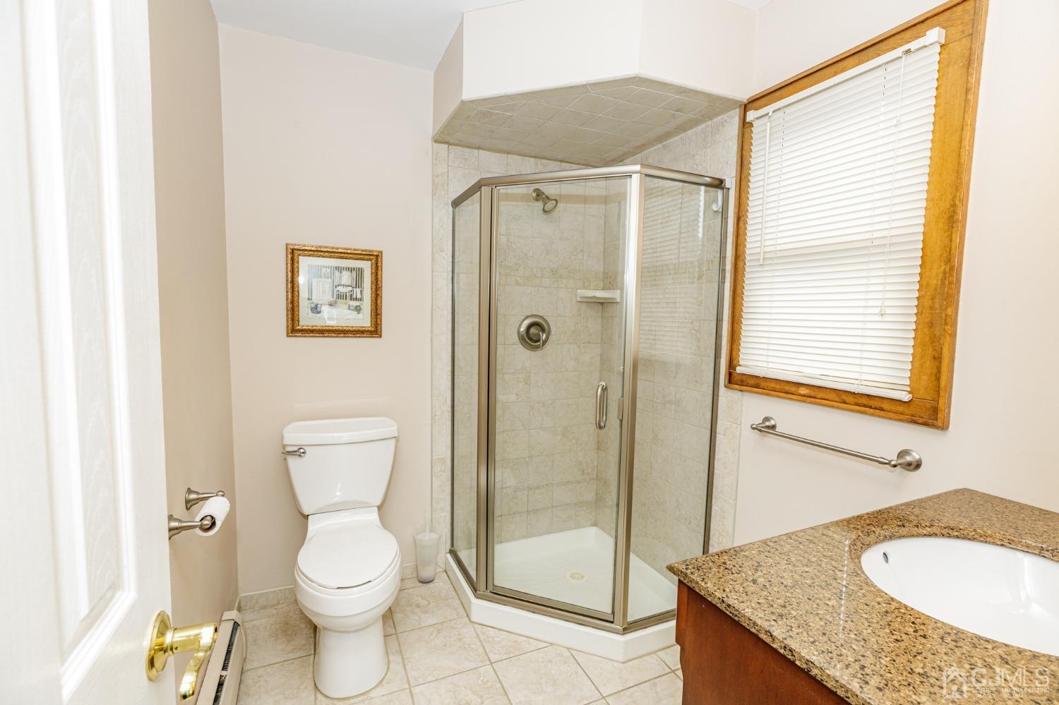 55 Old Post Road Edison, NJ 08817 - Photo 23 of 53 a bathroom with a granite countertop sink toilet and shower