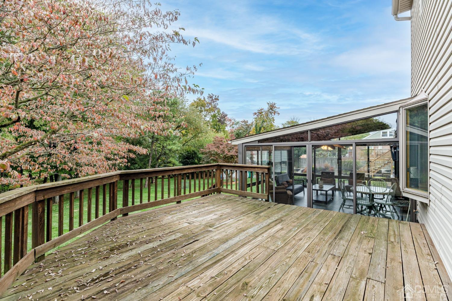55 Old Post Road Edison, NJ 08817 - Photo 36 of 53 a balcony with wooden floor and outdoor space
