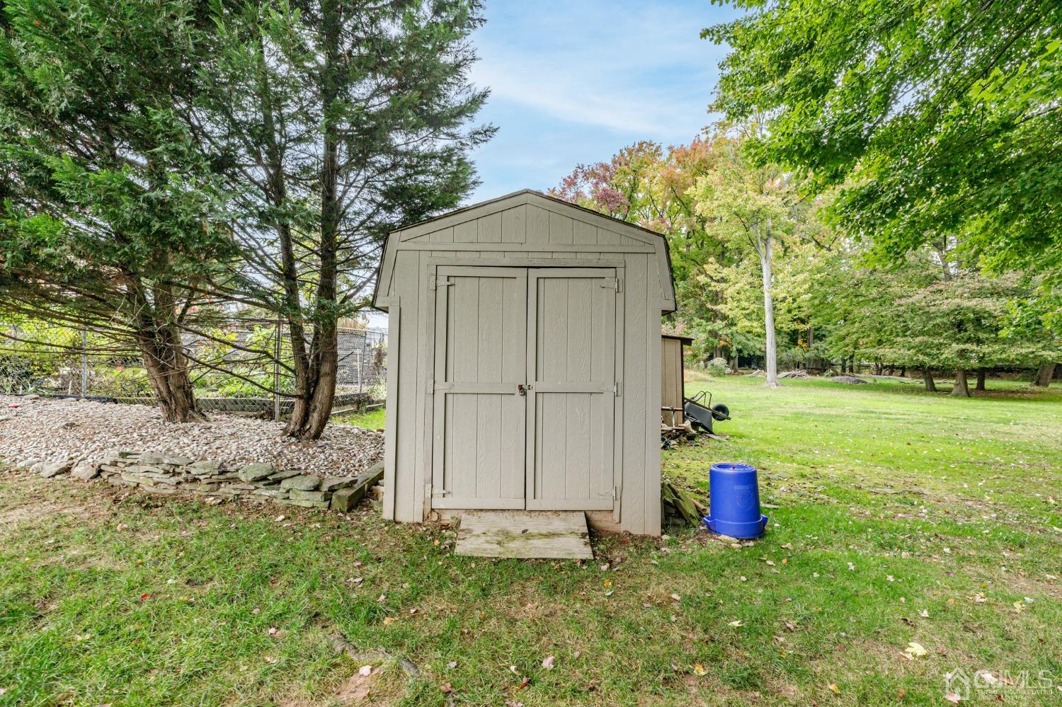 55 Old Post Road Edison, NJ 08817 - Photo 40 of 53 a front view of house with yard and trees
