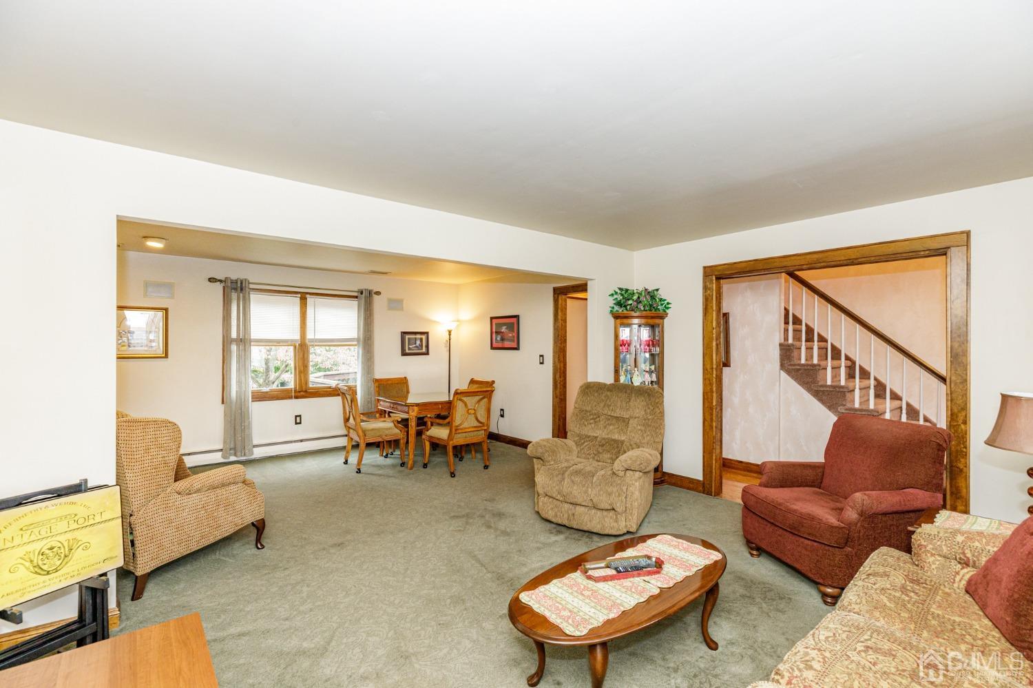 55 Old Post Road Edison, NJ 08817 - Photo 5 of 53 a living room with furniture and a window