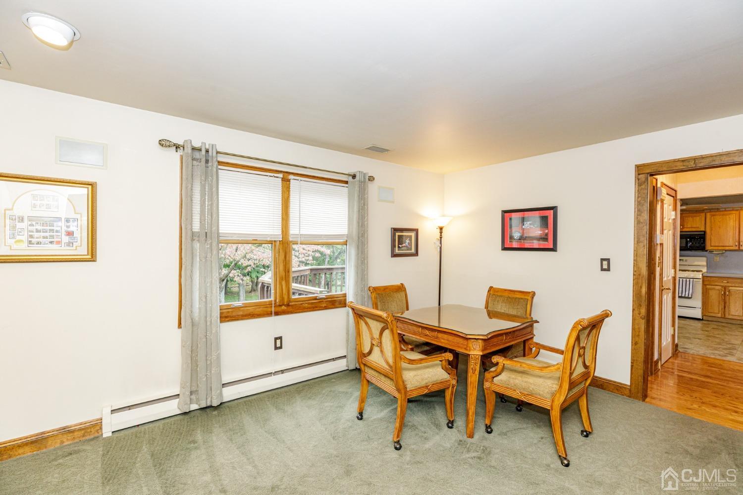 55 Old Post Road Edison, NJ 08817 - Photo 7 of 53 a view of a workspace with furniture and a window