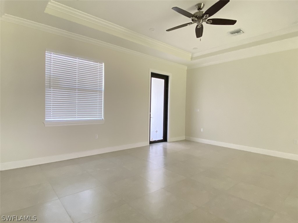 7337 Lobelia Road Fort Myers, FL 33967 - Photo 14 of 21 a view of an empty room with a window