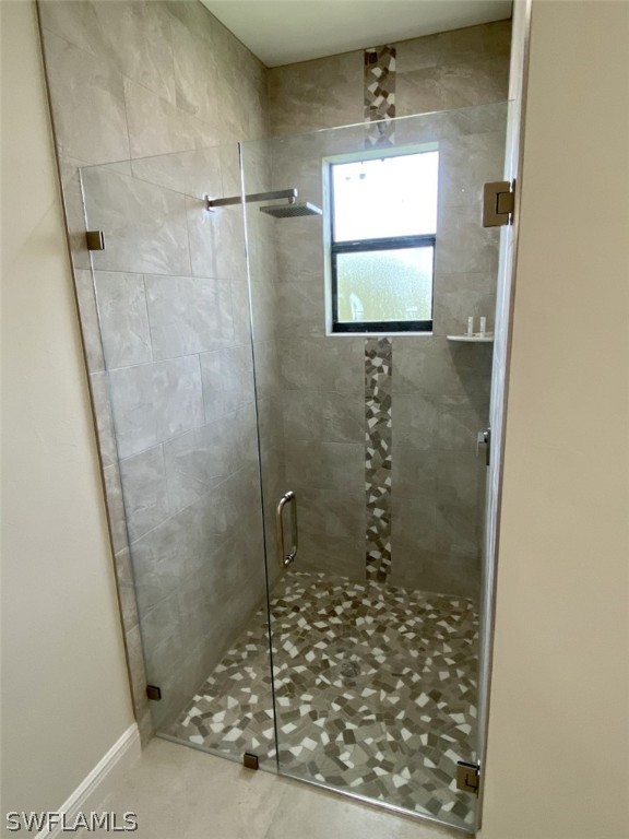 7337 Lobelia Road Fort Myers, FL 33967 - Photo 19 of 21 a bathroom with a shower