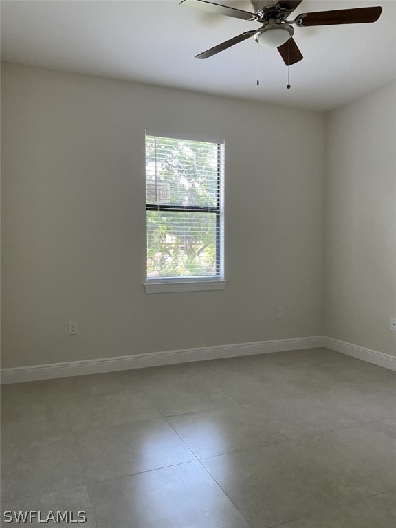 7337 Lobelia Road Fort Myers, FL 33967 - Photo 20 of 21 an empty room with a window