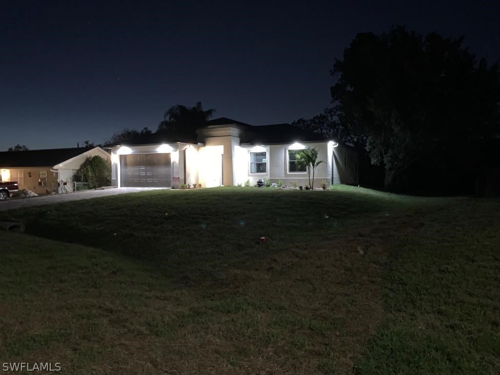 7337 Lobelia Road Fort Myers, FL 33967 - Photo 5 of 21 a view of back yard of the house