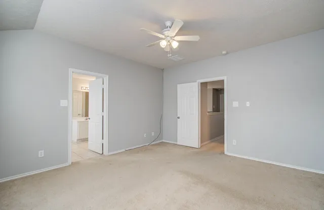 a view of an empty walk in closet