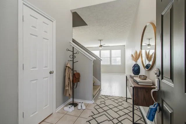 a view of an entryway with staircase