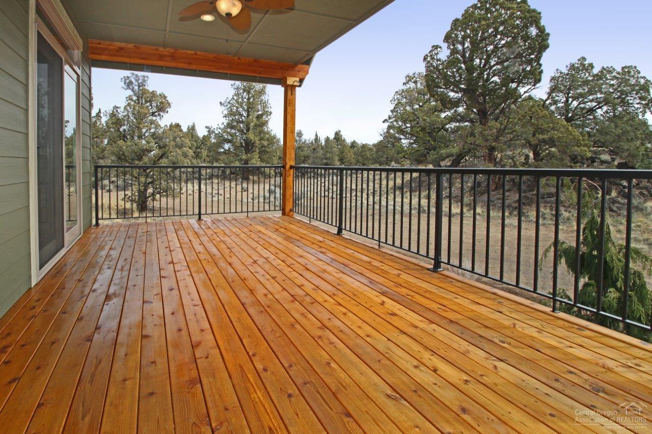 64534 Sylvan Loop Bend, OR 97701 - Photo 22 of 23 a balcony with wooden floor and fence
