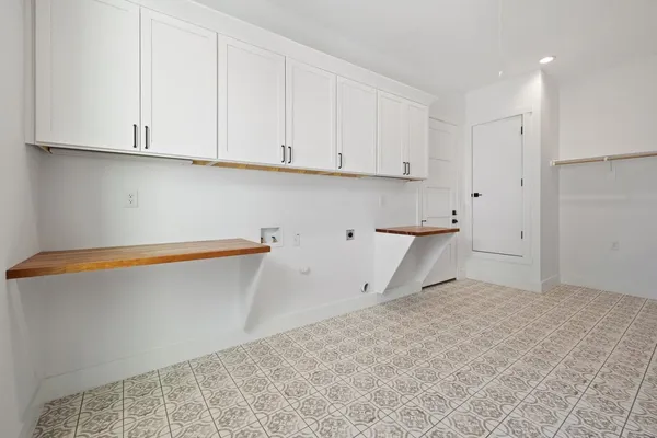 a view of a porch with wooden floor and outdoor space