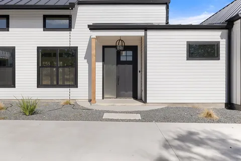 a front view of a house with a garage