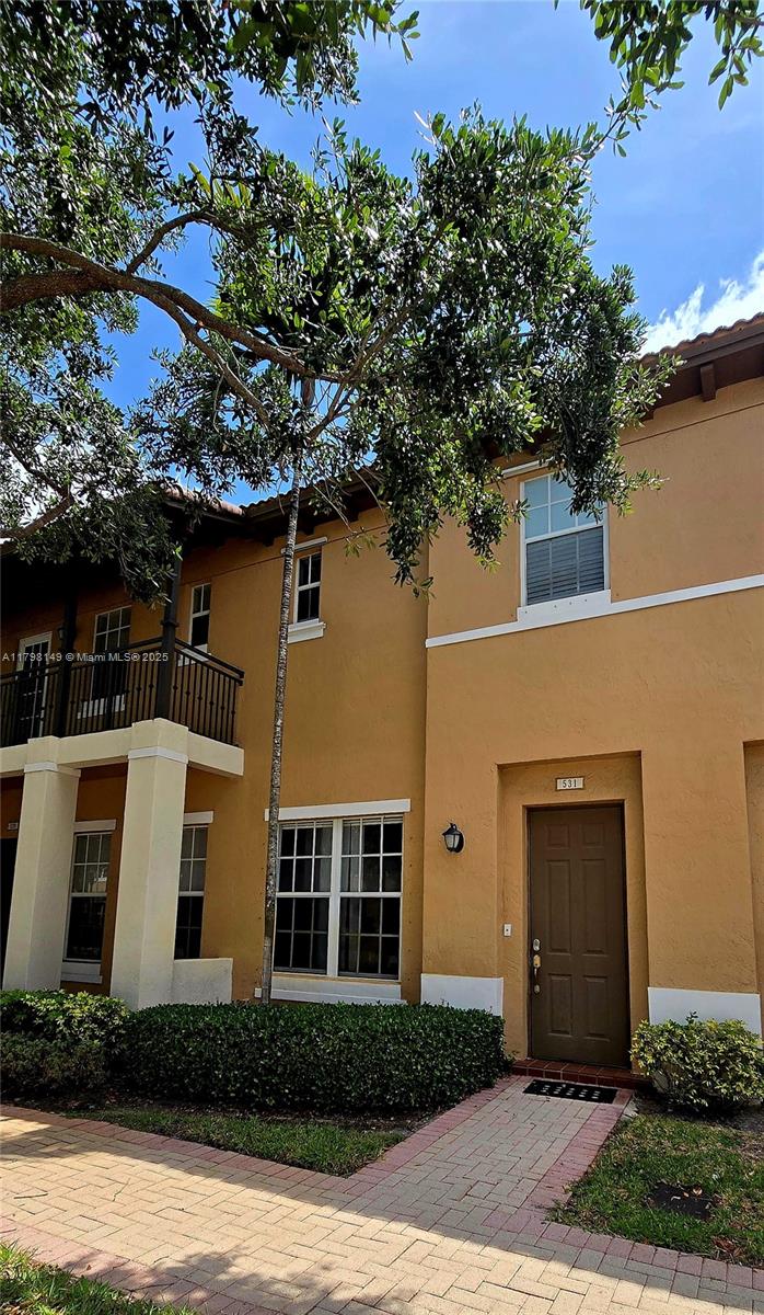 531 Southwest 147th Avenue, Unit 24 Pembroke Pines, FL 33027 - Photo 3 of 16 a front view of a house