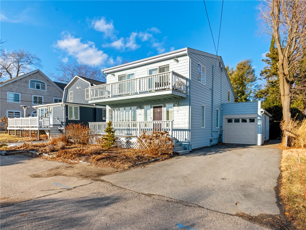 121 Melbourn Road Warwick, RI 02886 - Photo 2 of 36 Exterior front with driveway & garage