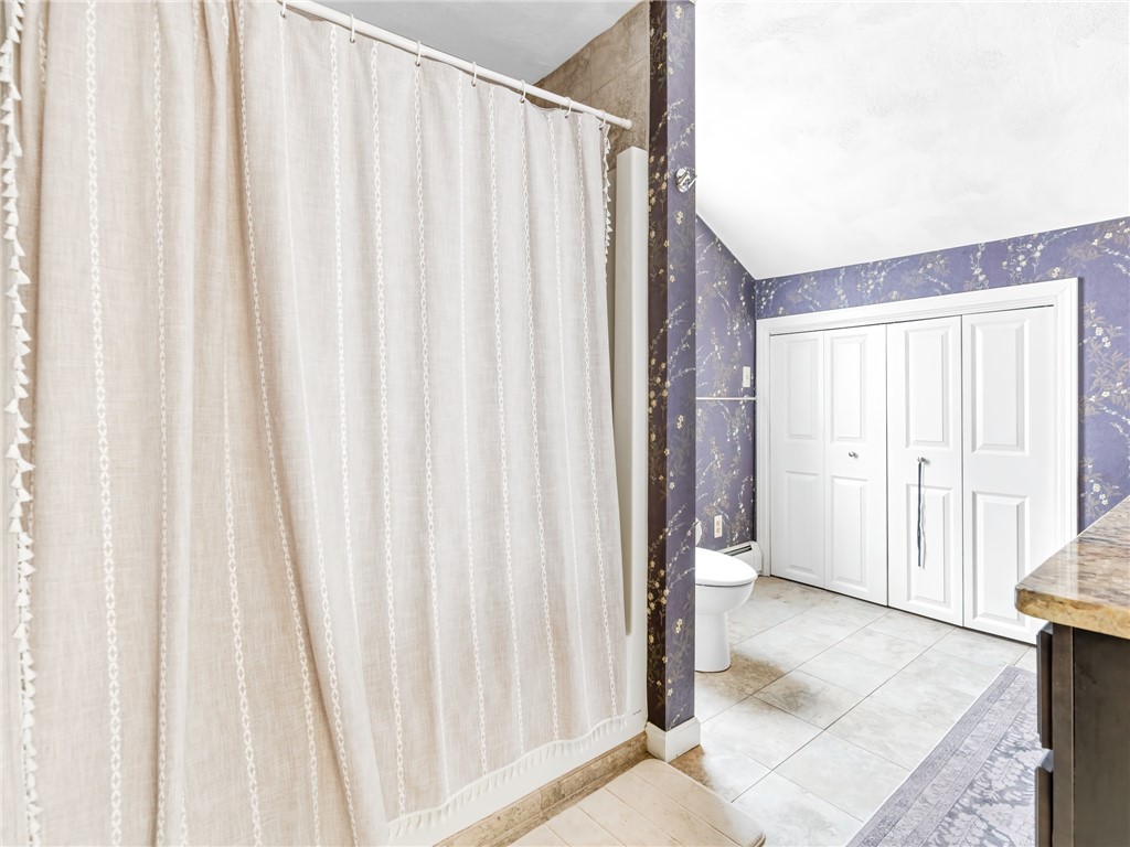 121 Melbourn Road Warwick, RI 02886 - Photo 25 of 36 Upstairs Bath with laundry in closet