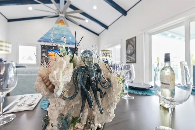 a bathroom with a sink double vanity granite tub and a mirror