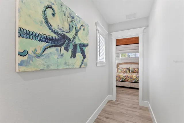 a view of a house with a yard patio and swimming pool