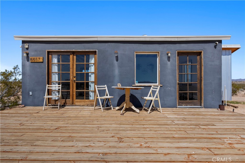 66750 Pole Line Road Joshua Tree, CA 92252 - Photo 6 of 36 a view of a house with lounge chair