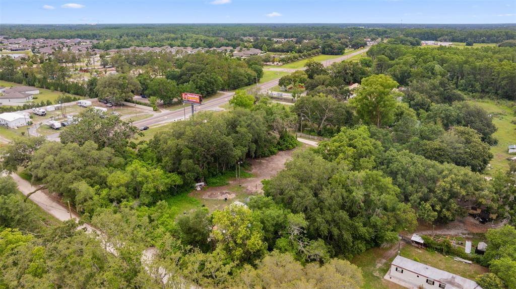 19057 Malabar Avenue Spring Hill, FL 34610 - Photo 14 of 23 a view of a lake with a mountain in the background