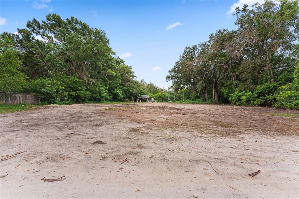 19057 Malabar Avenue Spring Hill, FL 34610 - Photo 5 of 23 a view of a field with a tree