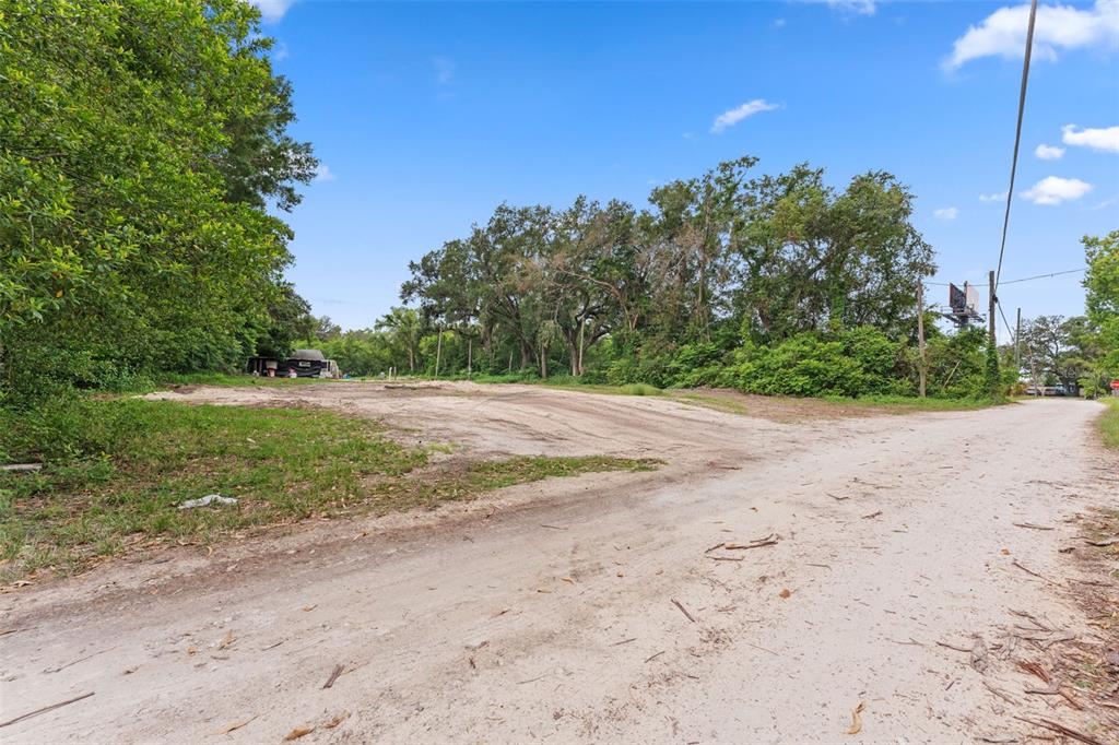 19057 Malabar Avenue Spring Hill, FL 34610 - Photo 9 of 23 a view of a backyard of a house