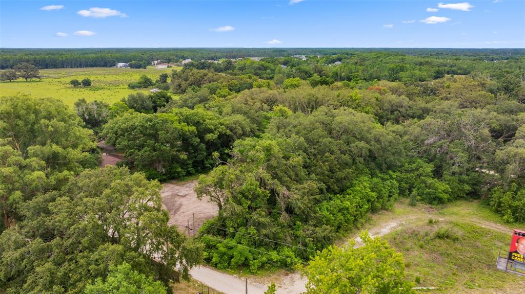19057 Malabar Avenue Spring Hill, FL 34610 - Photo 10 of 23 a view of an outdoor space and a yard