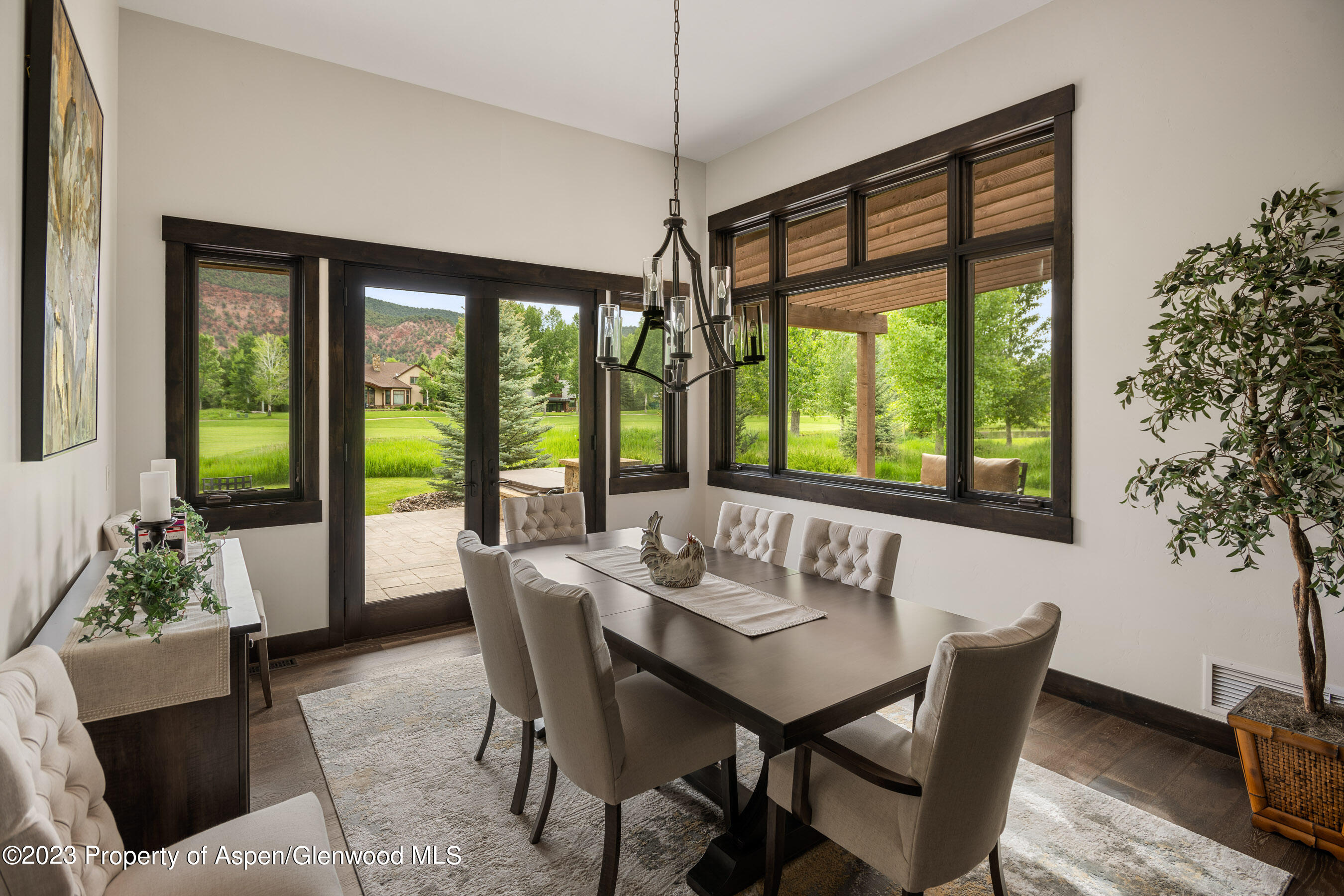54 Kingfisher Carbondale, CO 81623 - Photo 20 of 39 a view of a dining room with furniture window and outside view