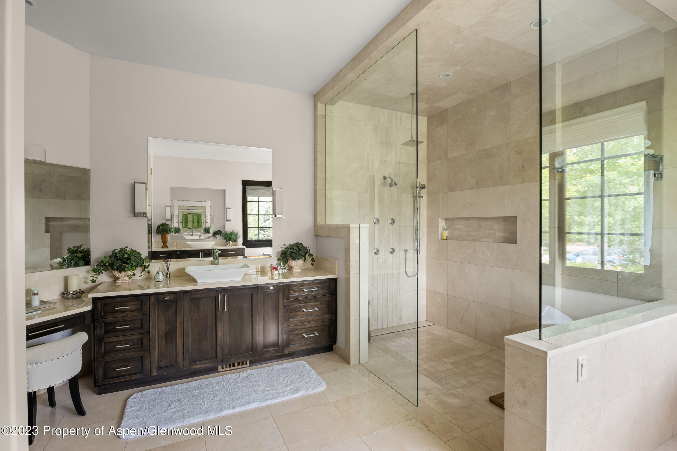 54 Kingfisher Carbondale, CO 81623 - Photo 24 of 39 a bathroom with a double vanity sink a mirror and a shower