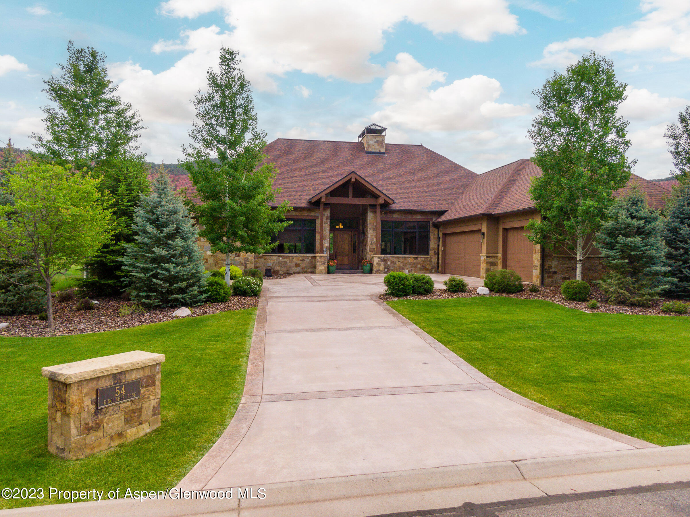 54 Kingfisher Carbondale, CO 81623 - Photo 32 of 39 a front view of a house with yard