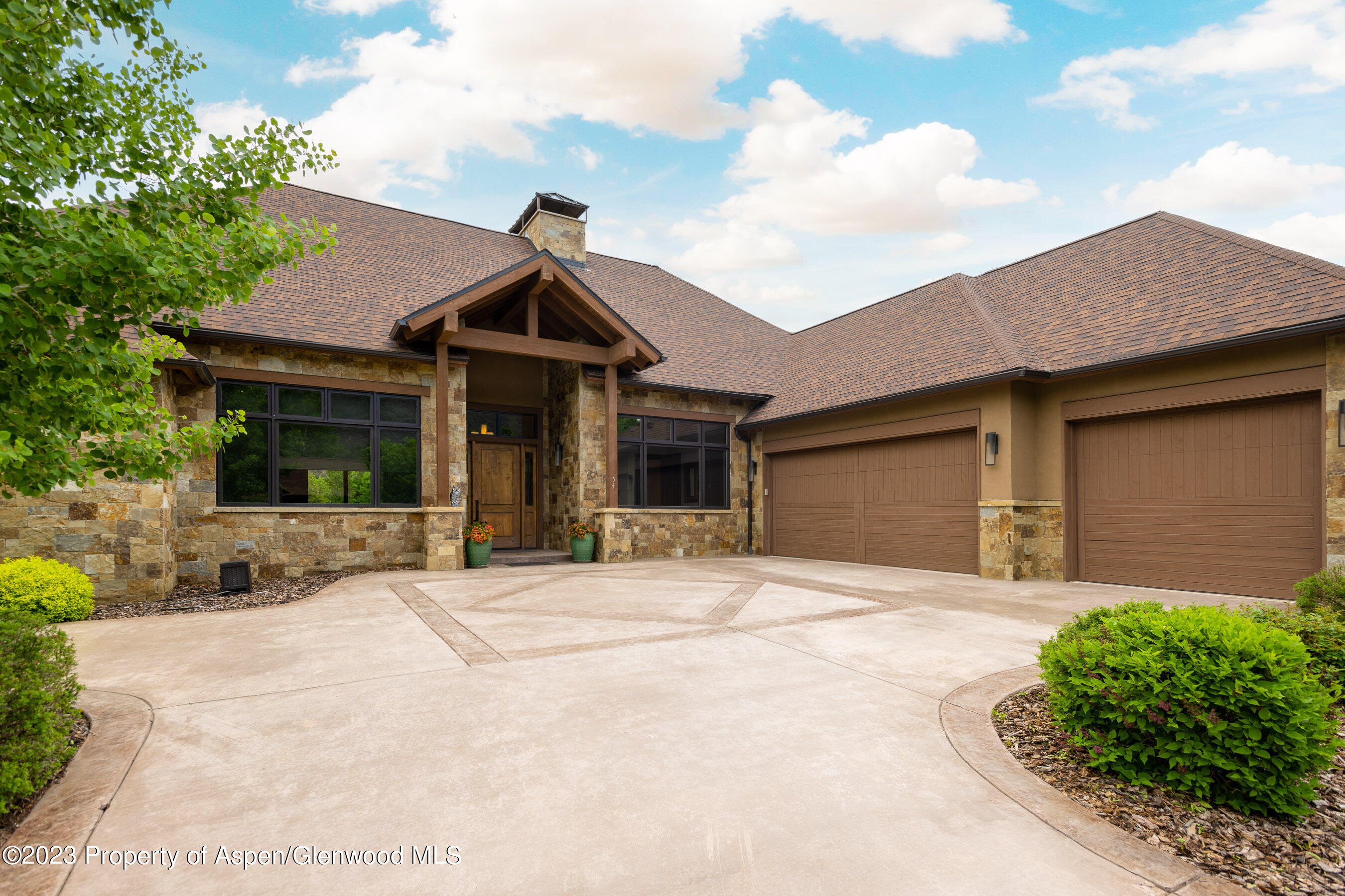 54 Kingfisher Carbondale, CO 81623 - Photo 38 of 39 a front view of a house with garden