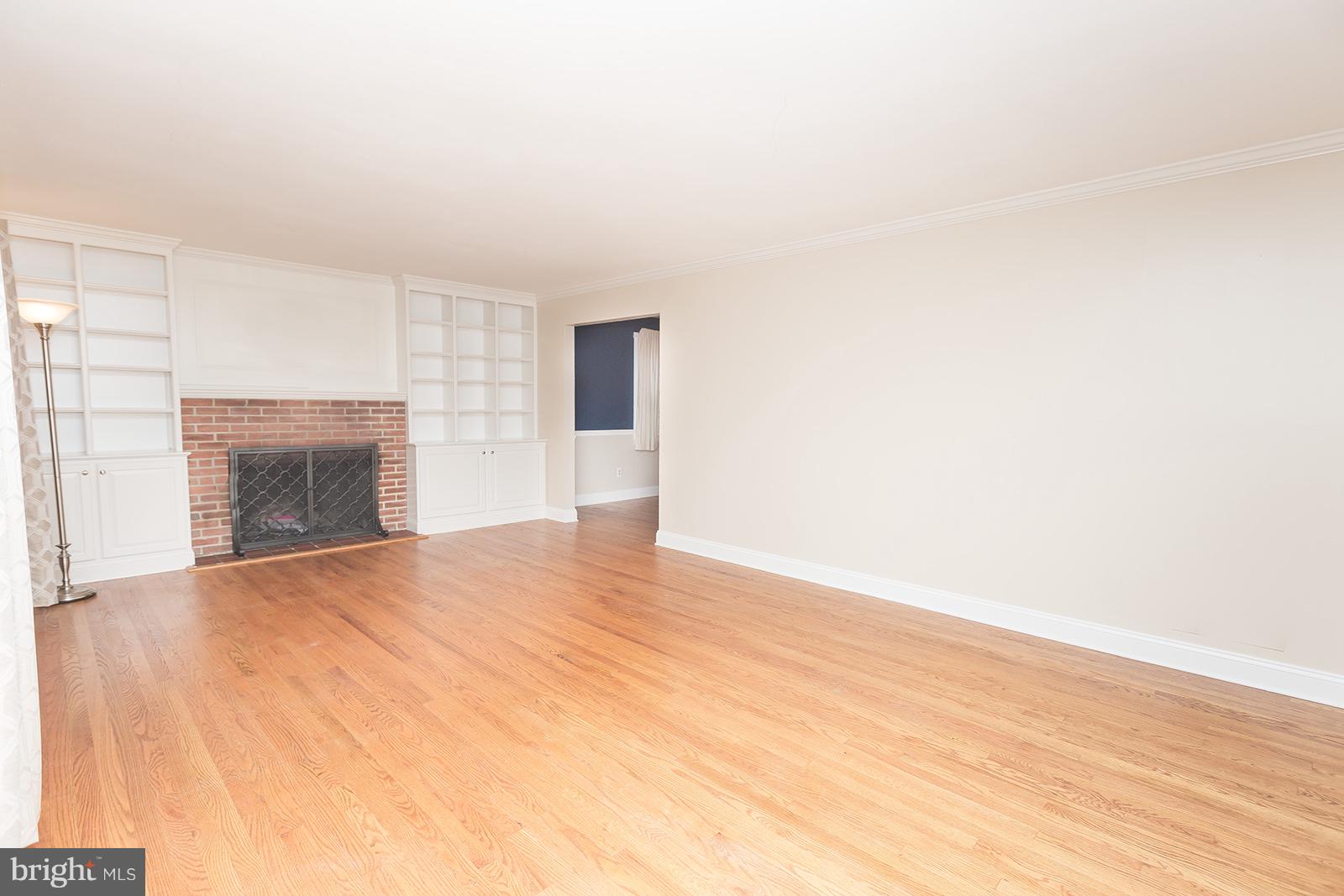 6505 Crestwood Road Baltimore, MD 21239 - Photo 3 of 26 Living Room with wood burning fireplace