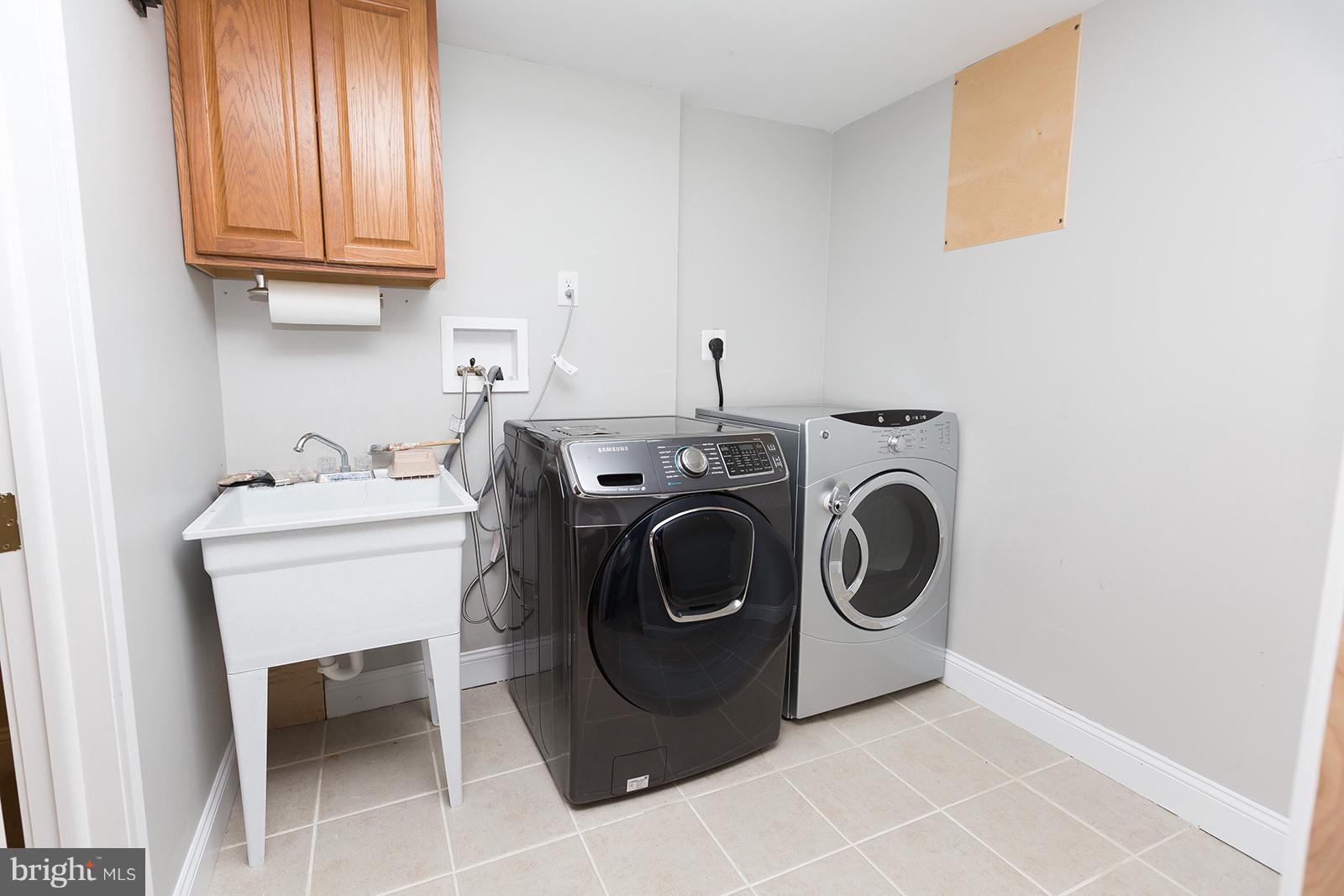 6505 Crestwood Road Baltimore, MD 21239 - Photo 22 of 26 Laundry room in basement; washer 2017