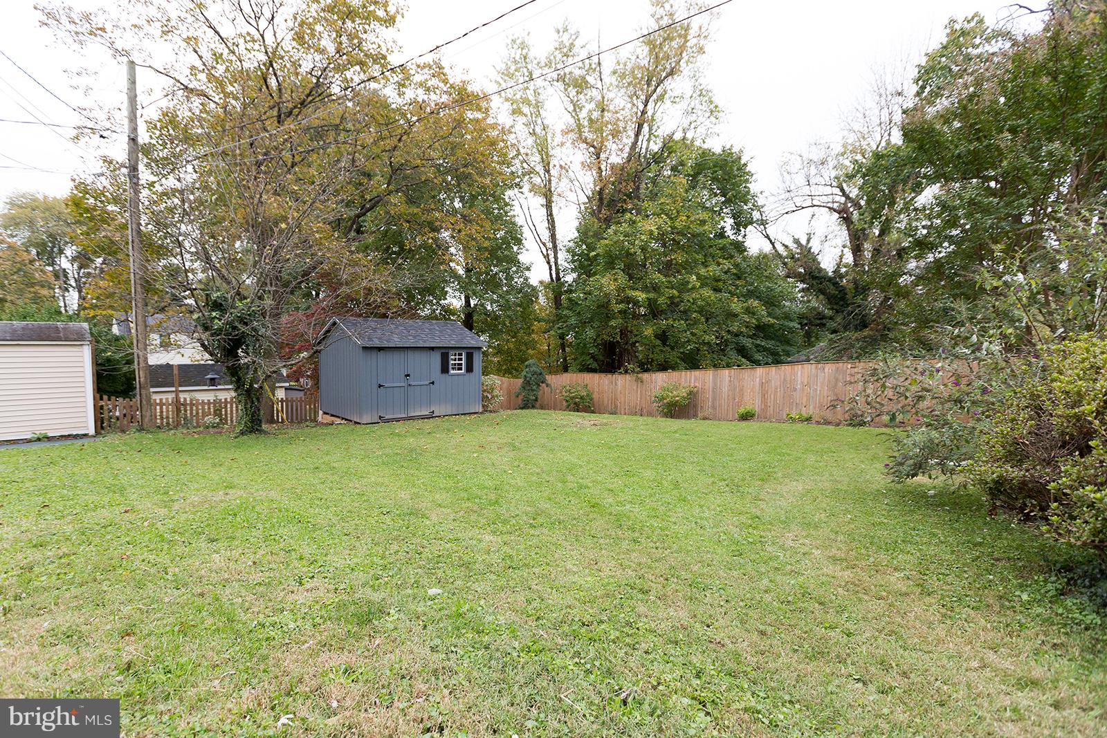 6505 Crestwood Road Baltimore, MD 21239 - Photo 24 of 26 Large fenced yard; fence 2016
