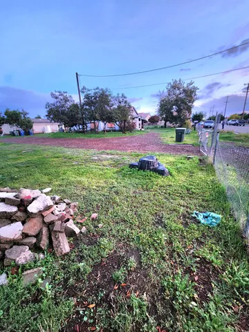 a view of a yard with an outdoor space