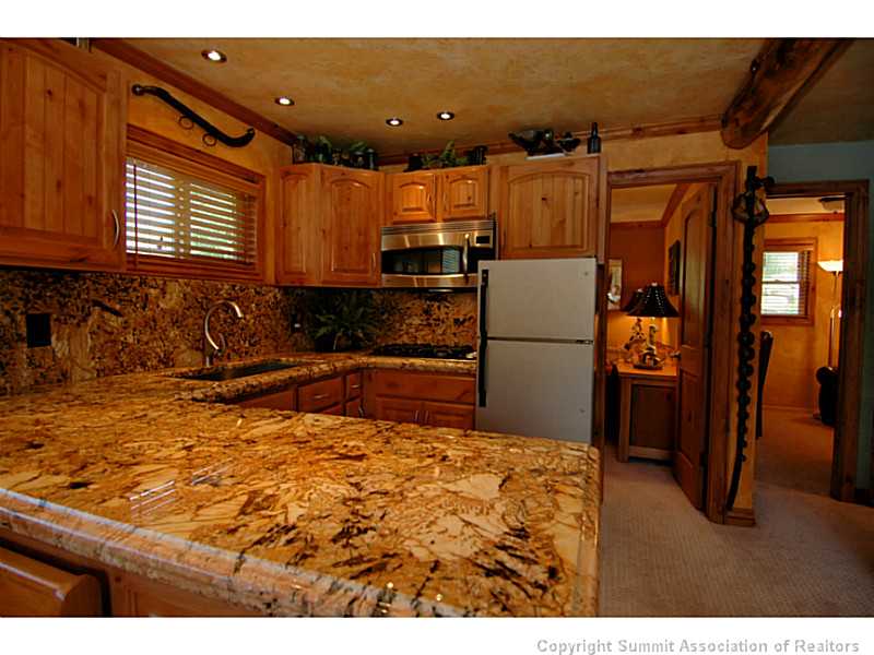 19 West Hansen Road Keystone, CO 80435 - Photo 2 of 25 Kitchen. The kitchen features gorgeous counters and appliances.